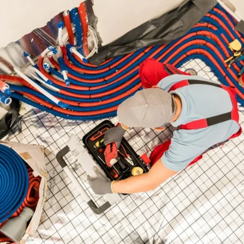 Elektryk, Gazownik i hydraulik podczas pracy Tychy